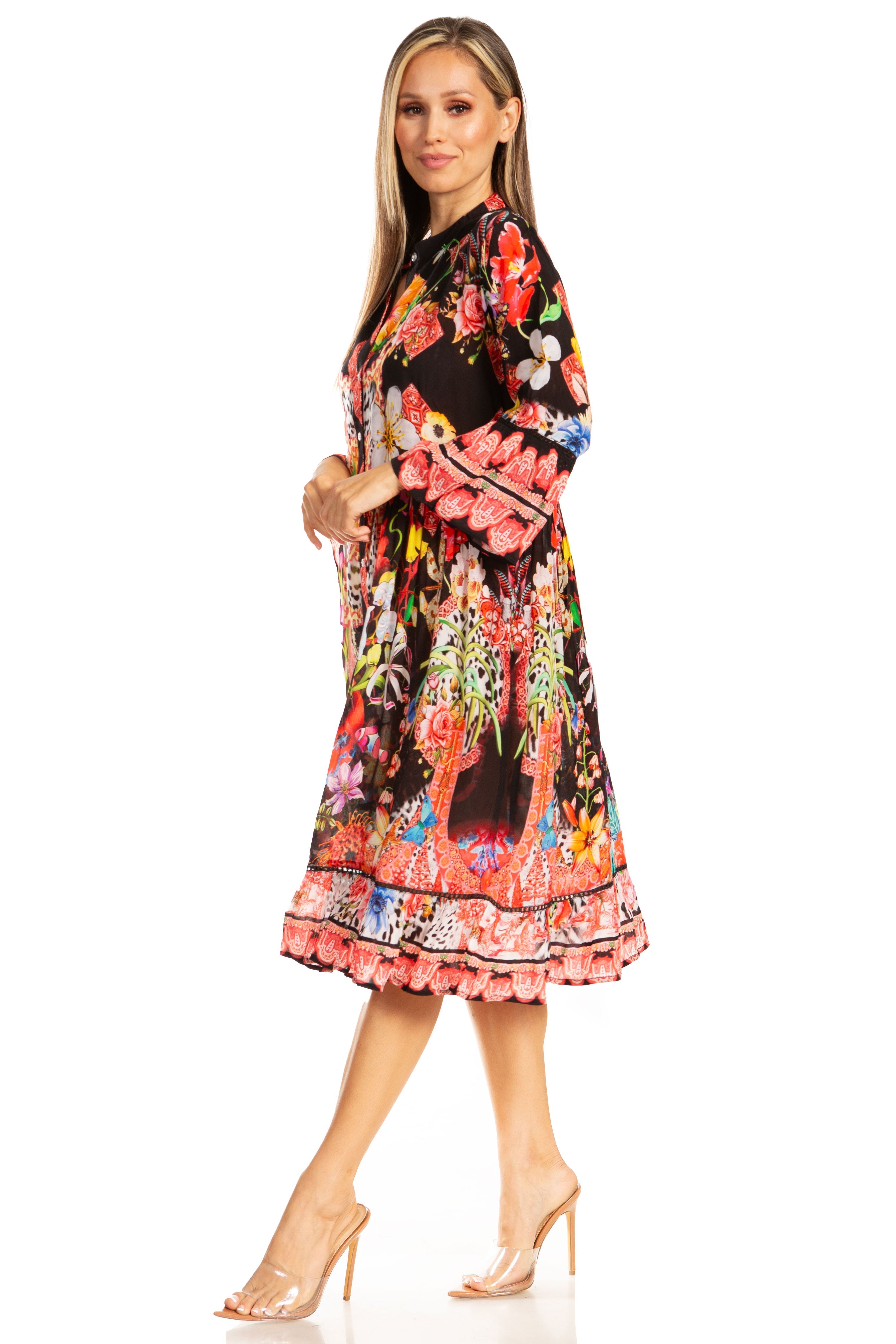 Woman wearing a colorful floral dress on a white background