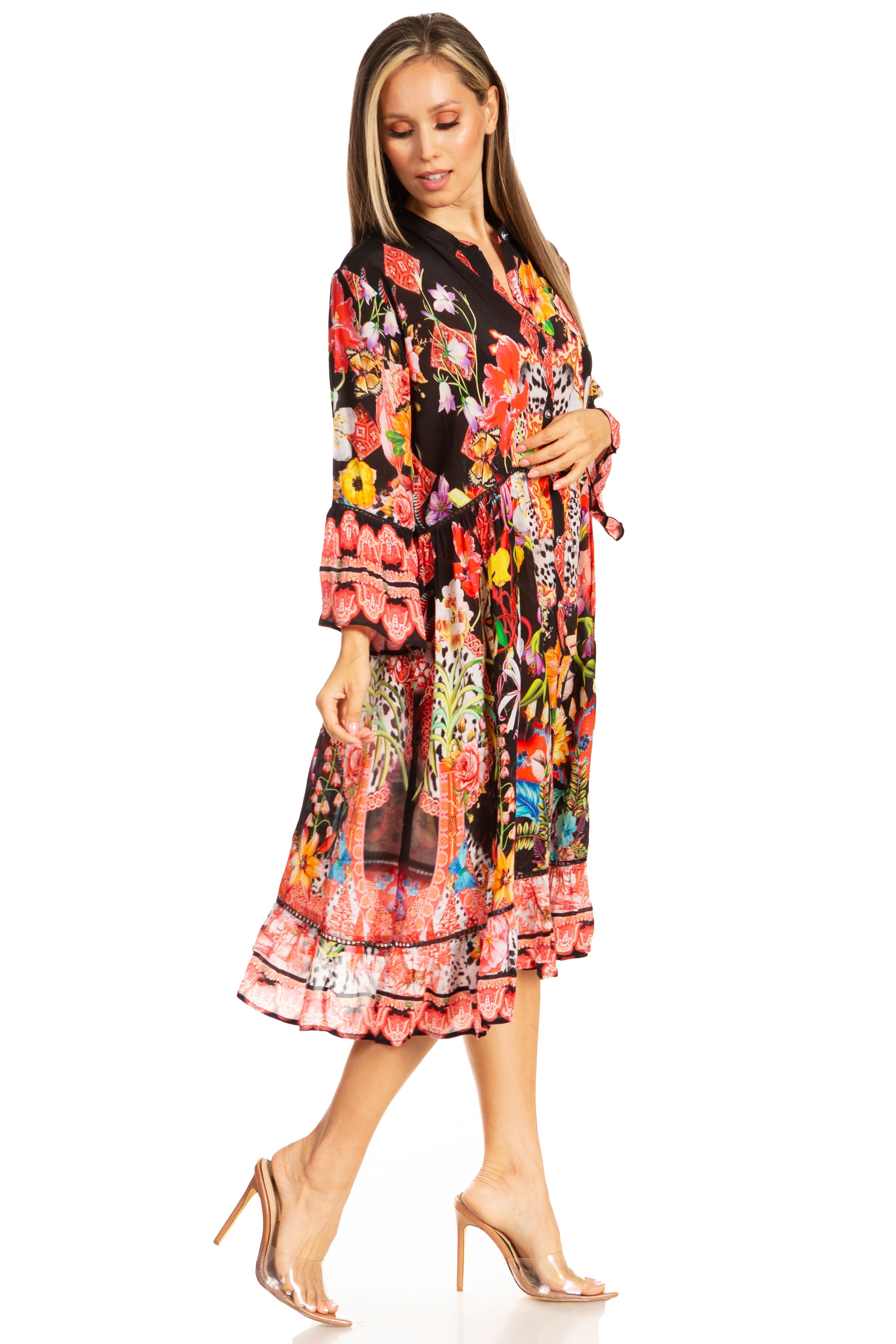Woman wearing a colorful floral dress on a white background