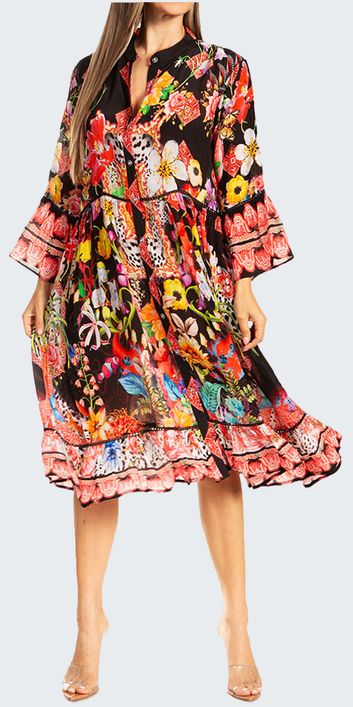 Woman wearing a colorful floral dress on a white background