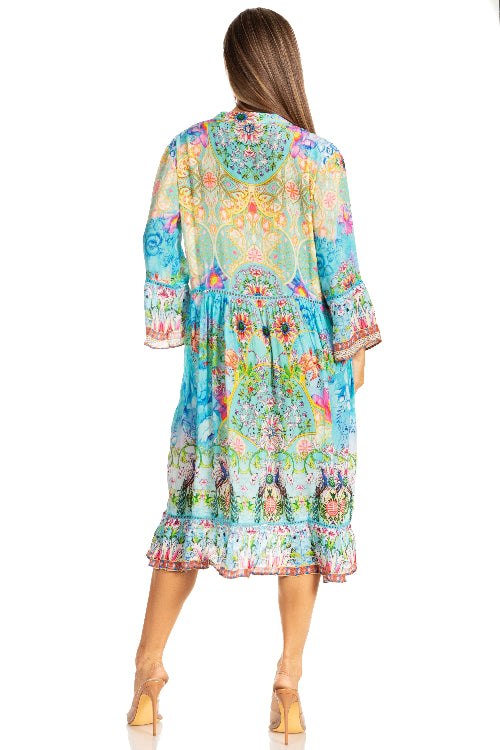 Woman wearing a colorful floral dress on a white background