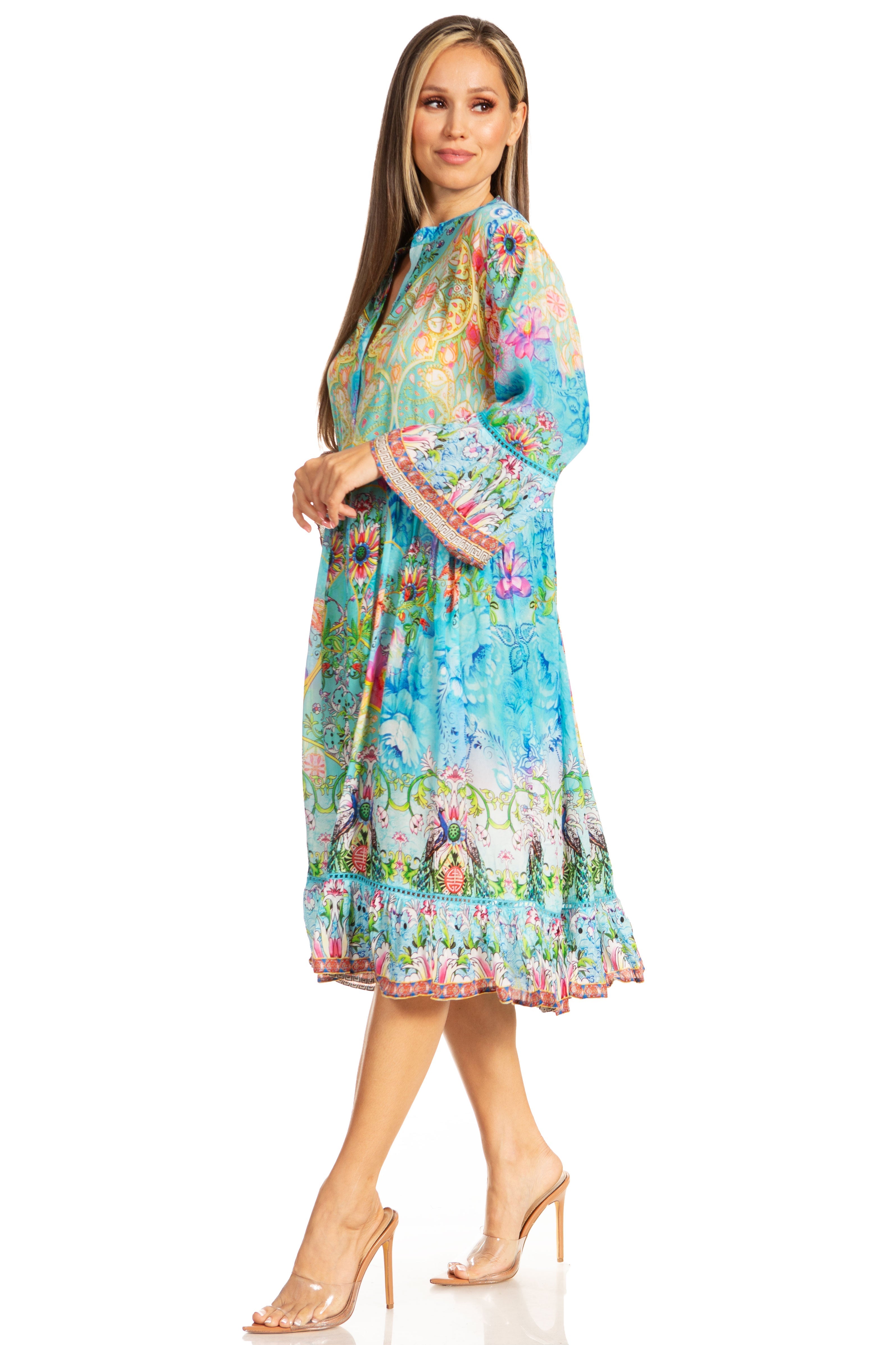 Woman wearing a colorful dress with floral pattern on a white background