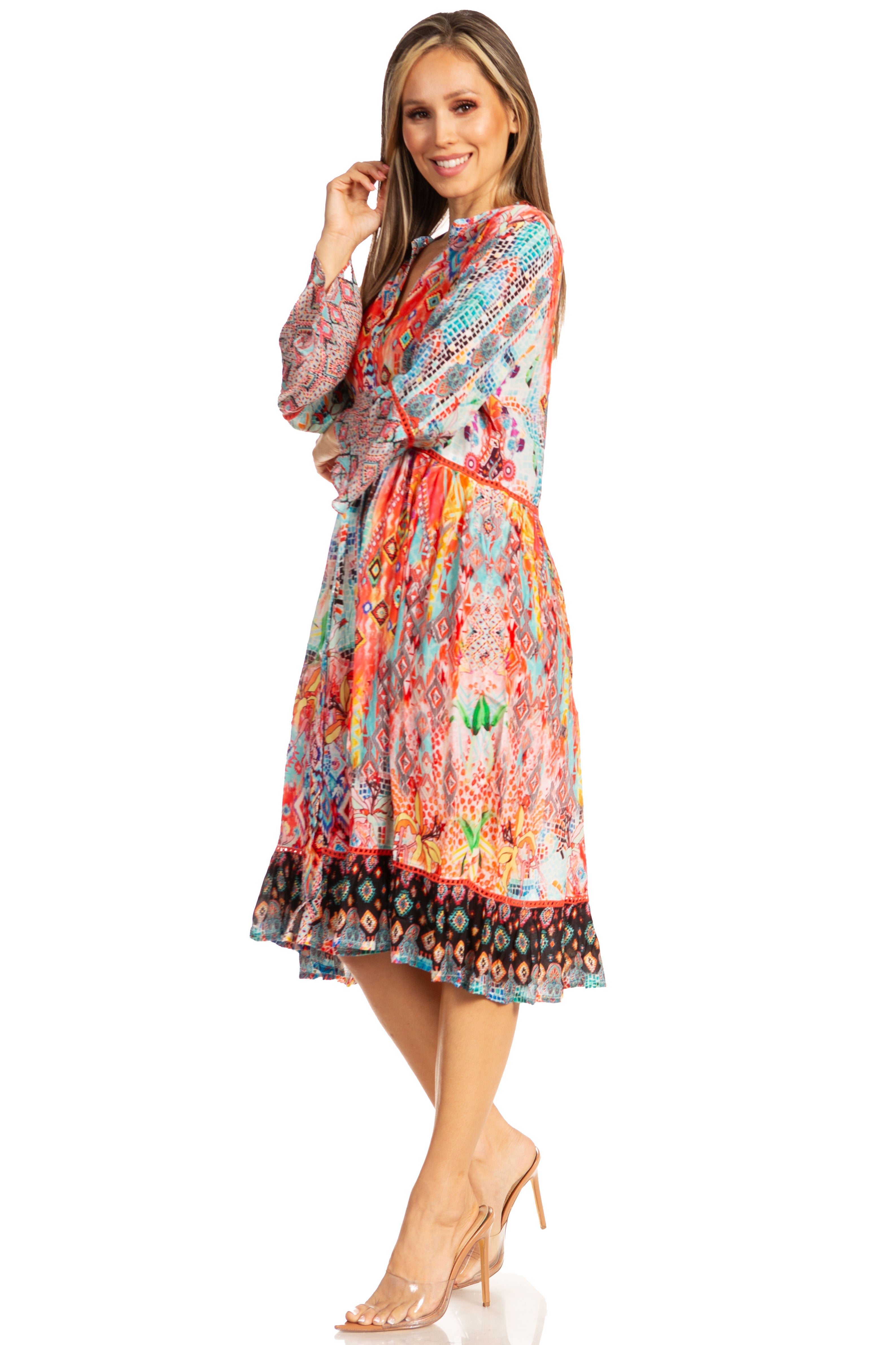Woman wearing a colorful patterned dress on a white background