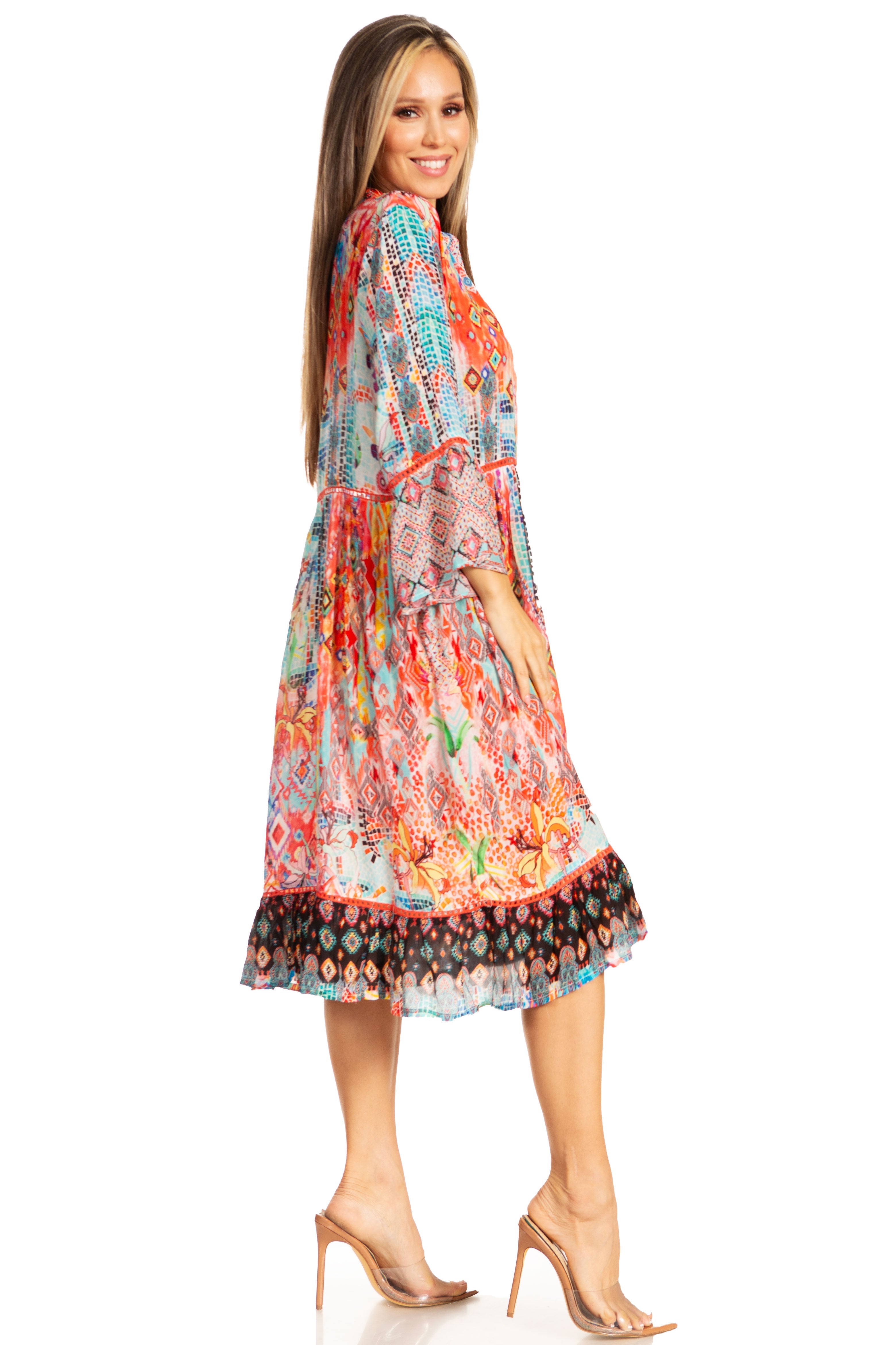 Woman wearing a colorful patterned dress on a white background
