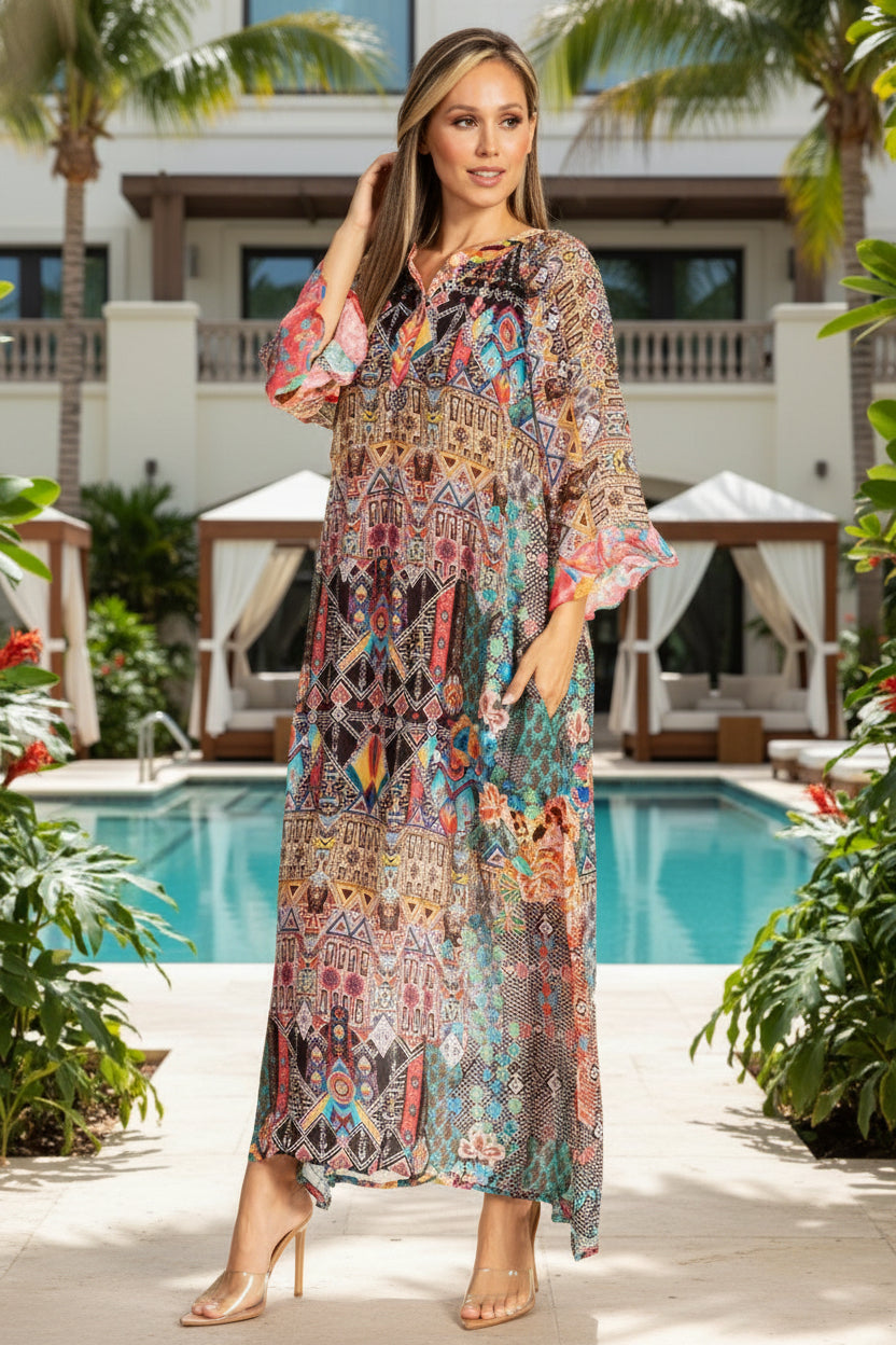 Woman wearing a colorful patterned dress on a white background