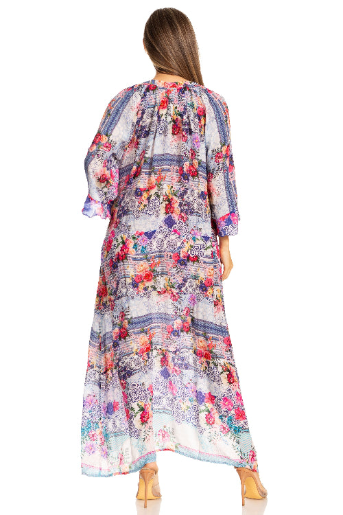 Woman wearing a colorful floral dress on a white background