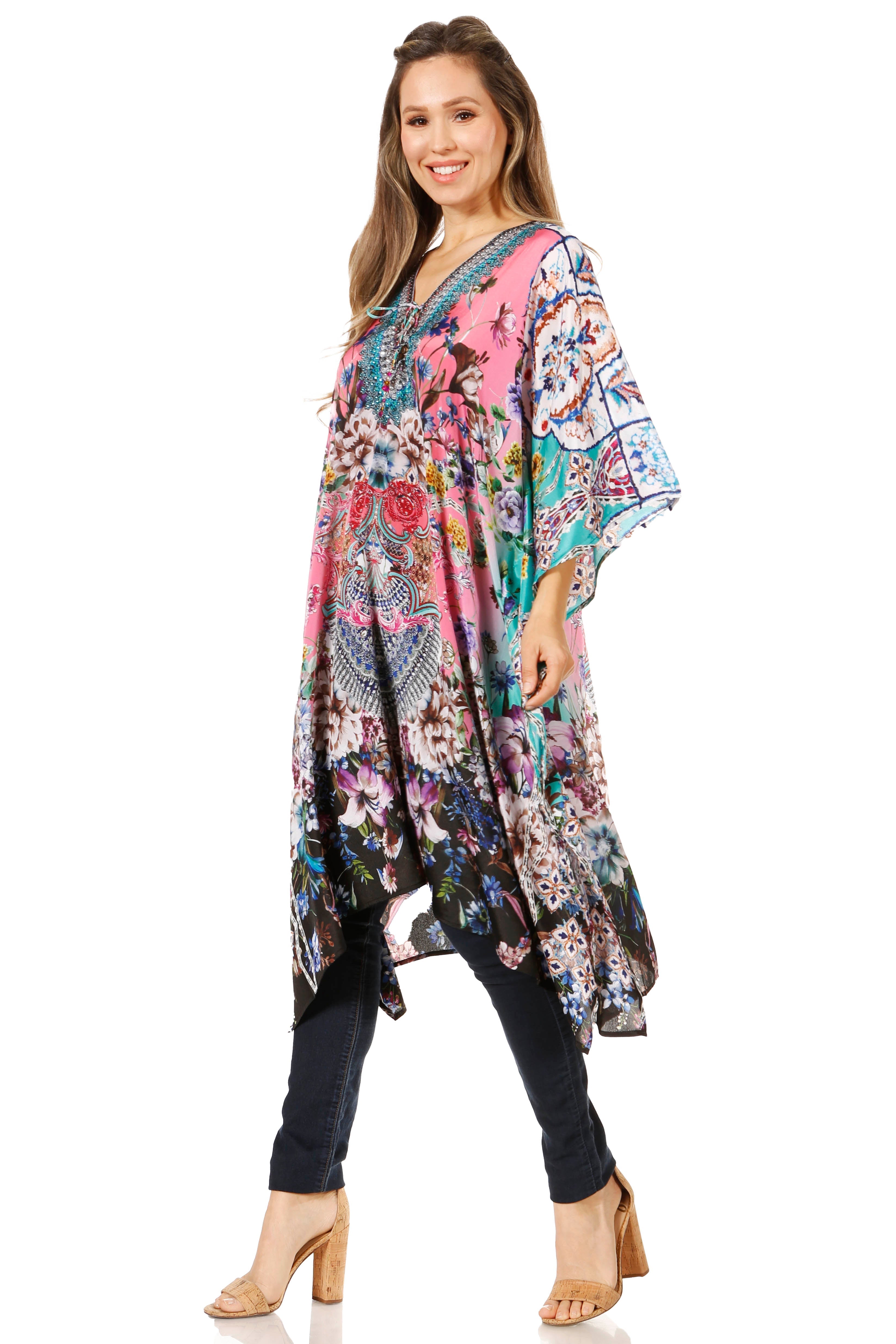 Woman wearing a colorful floral dress on a white background
