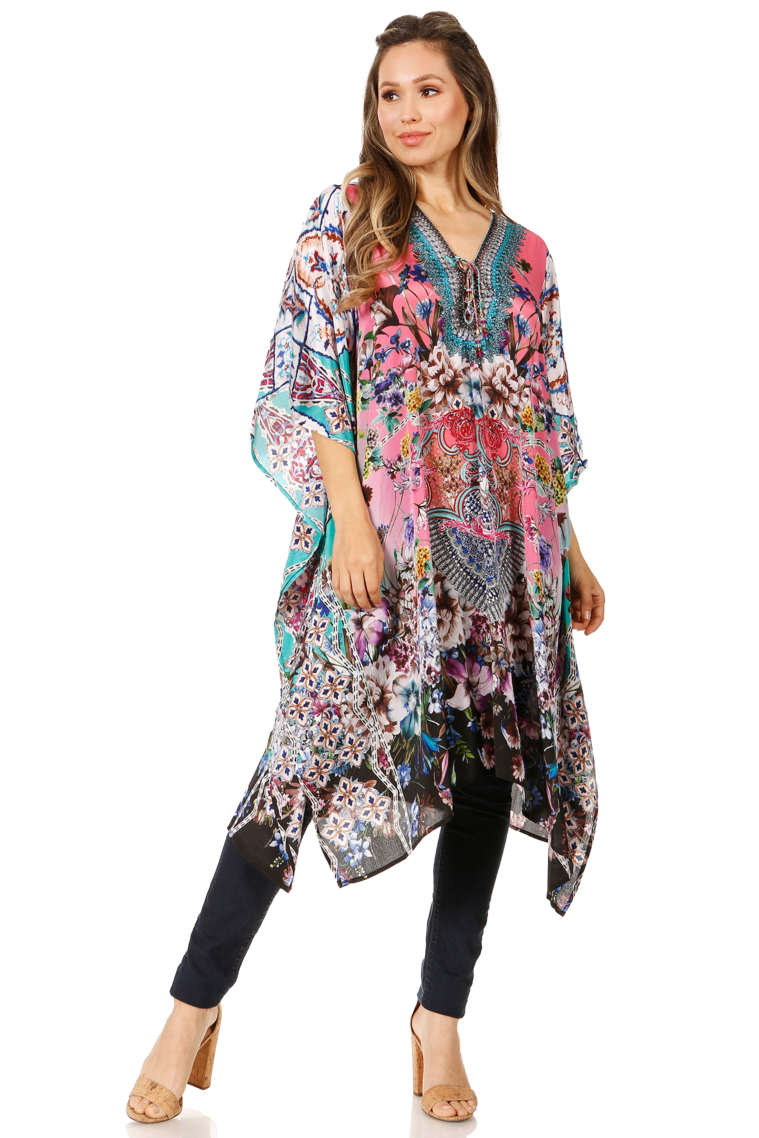 Woman wearing a colorful floral kimono-style garment on a white background