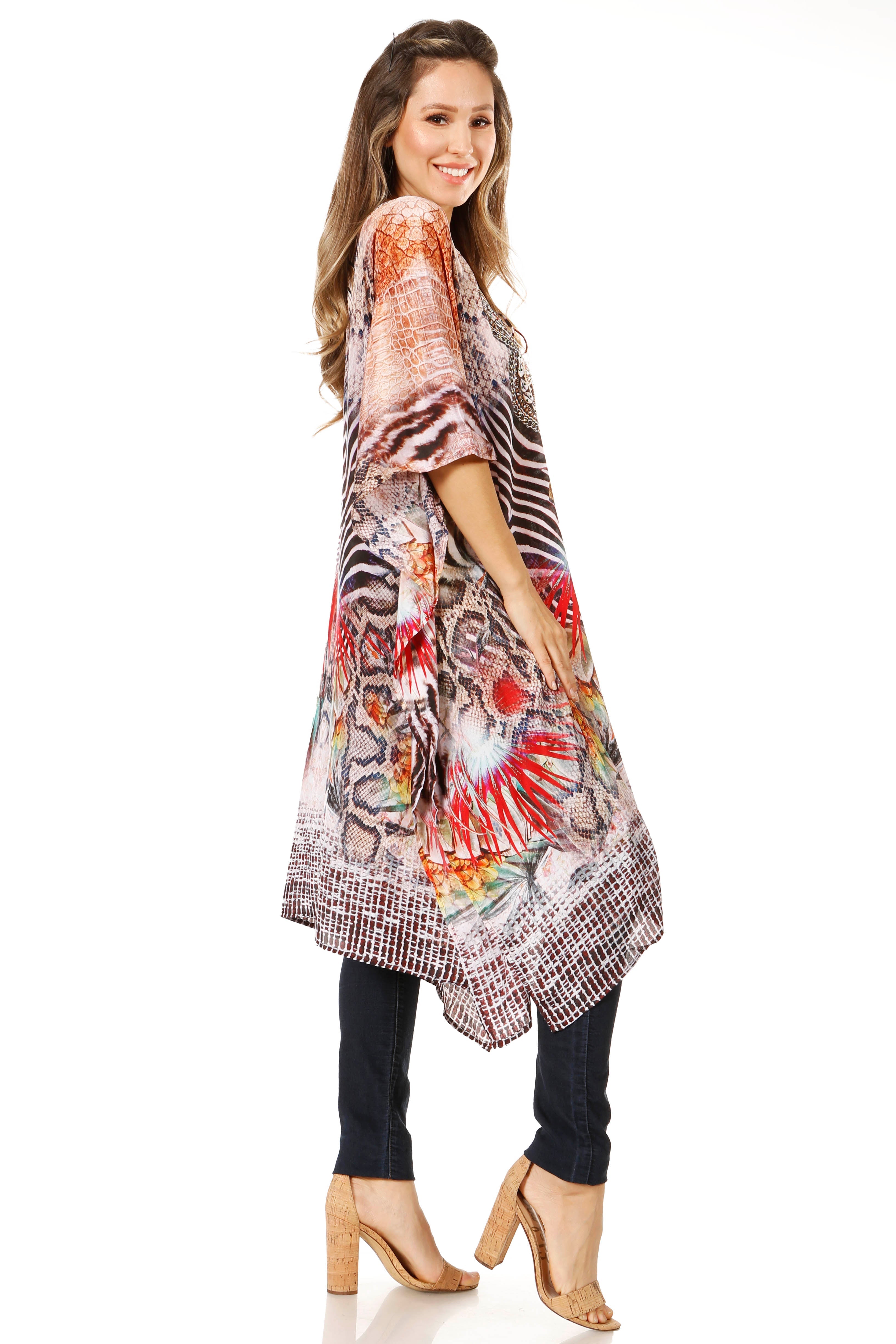 Woman wearing a colorful patterned dress on a white background