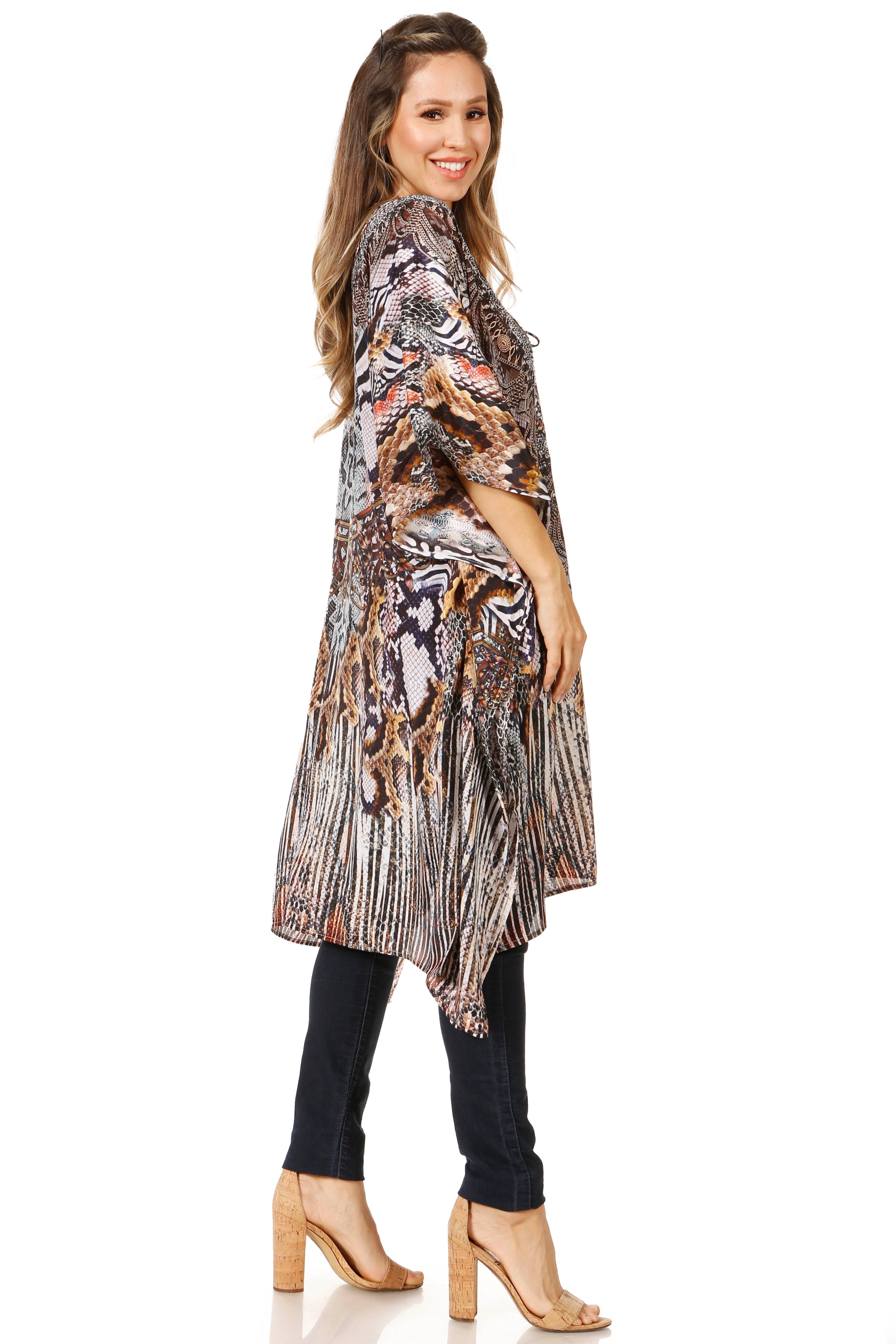 Woman wearing a patterned kimono-style top on a white background