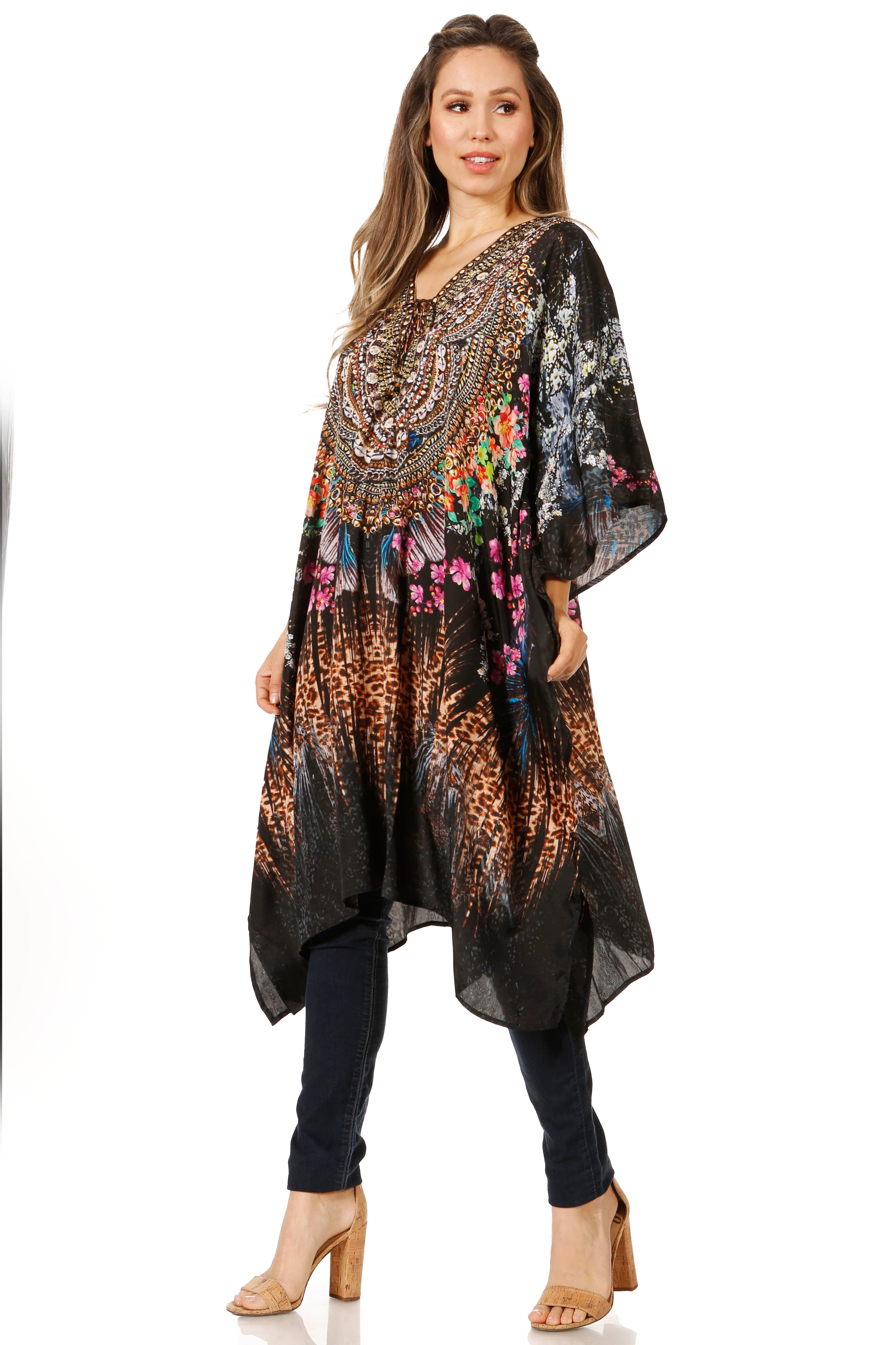 Woman wearing a long, patterned dress with a white background