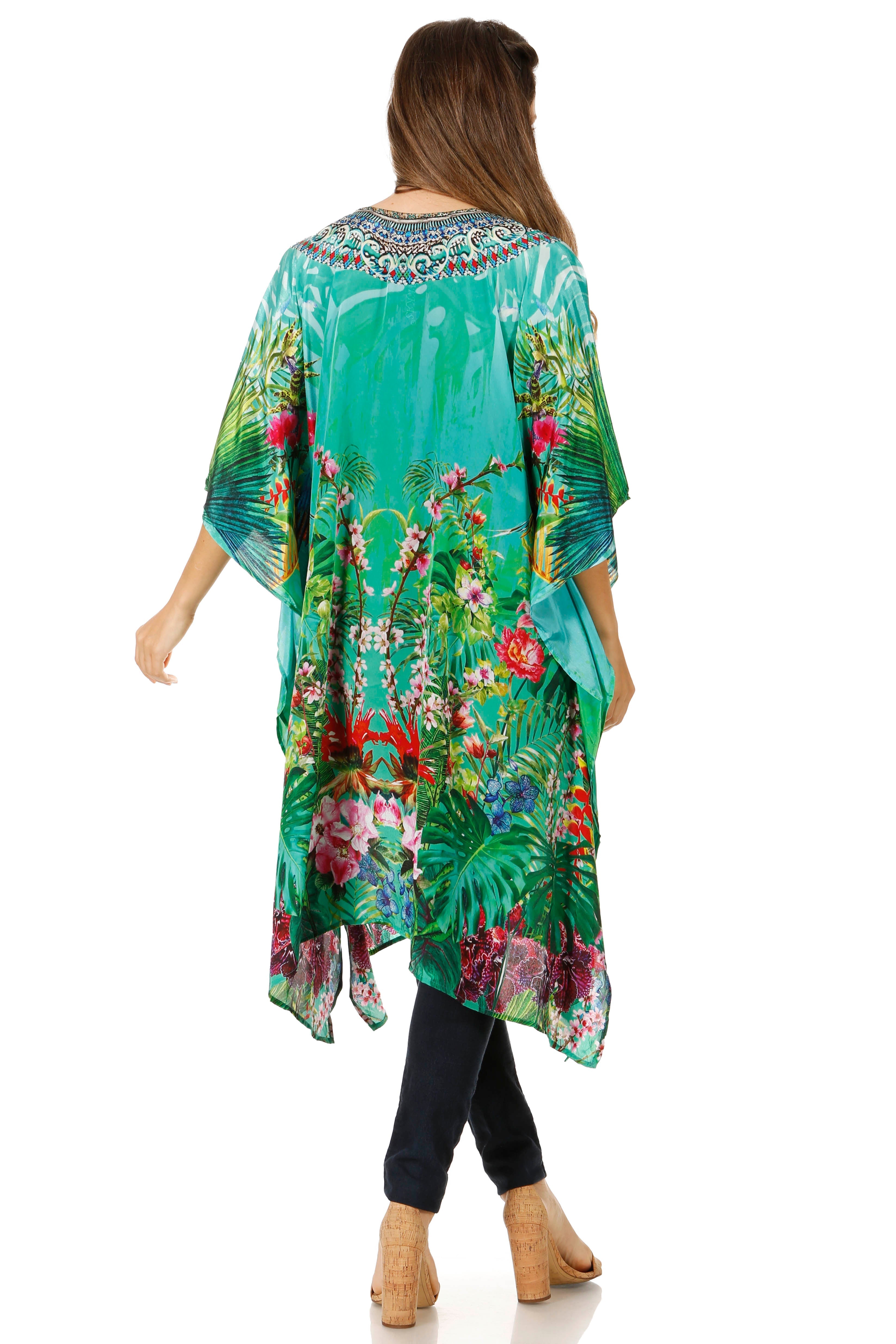 Woman wearing a colorful floral kimono on a white background