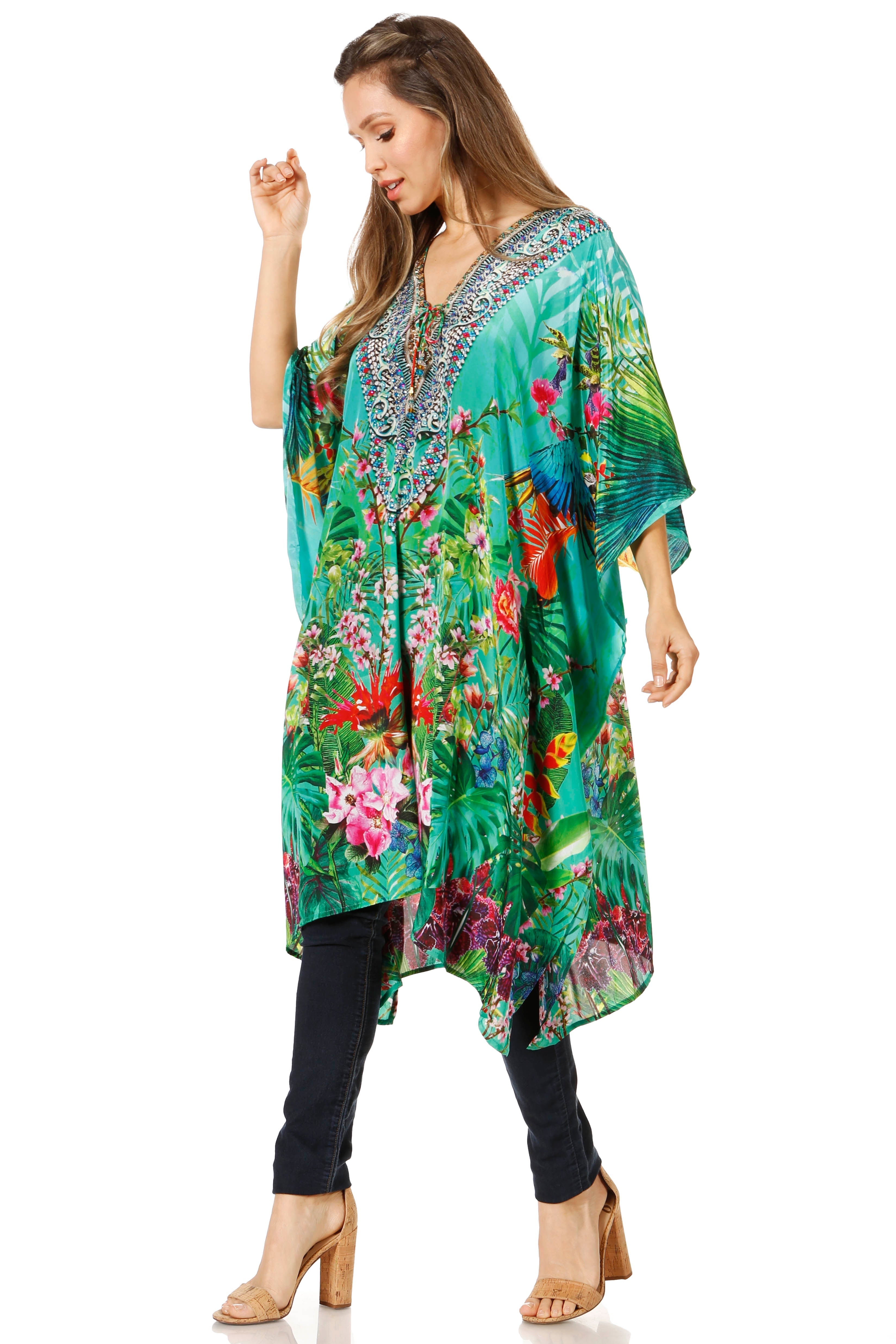 Woman wearing a colorful floral kimono-style garment on a white background