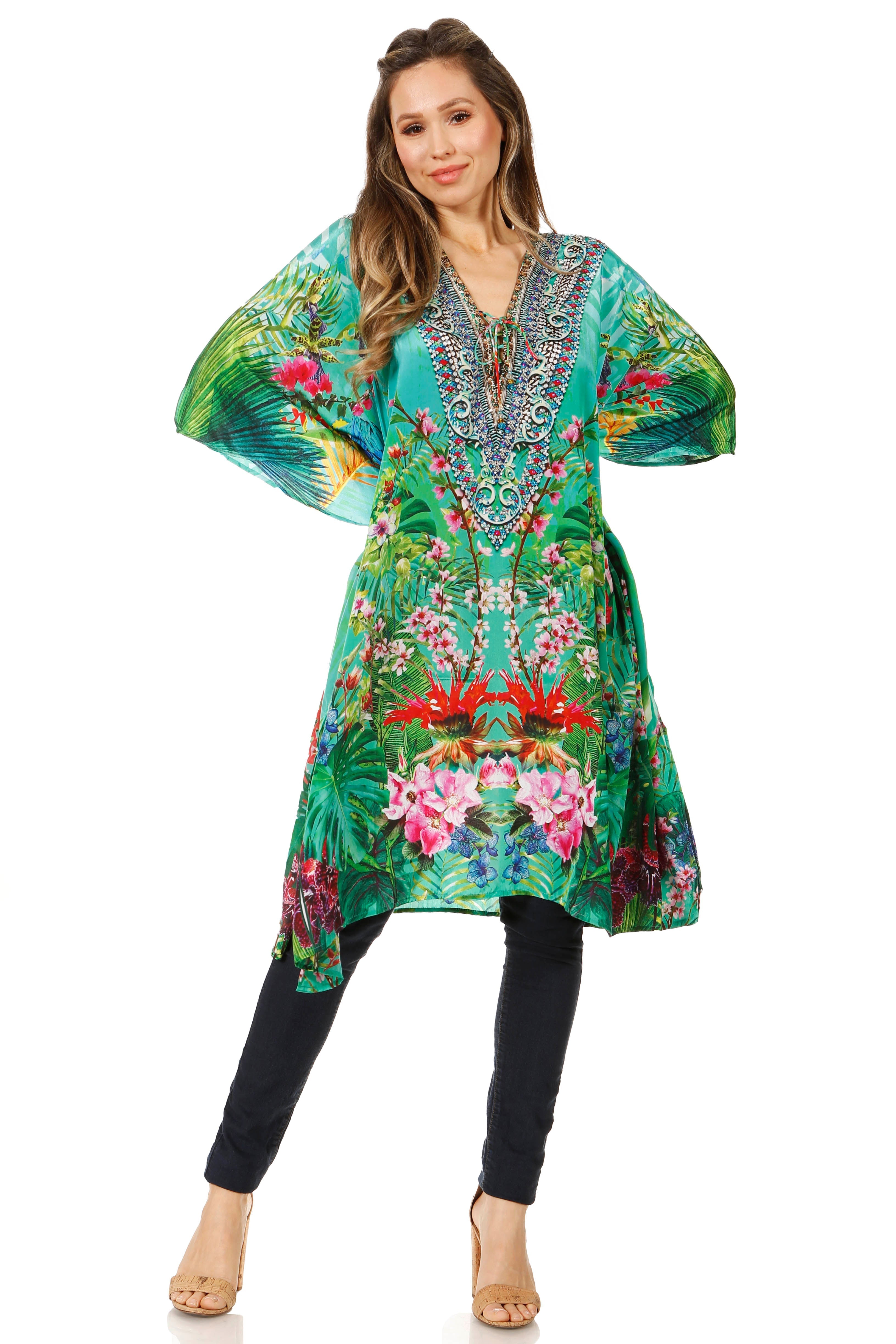 Woman wearing a colorful floral dress with a white background
