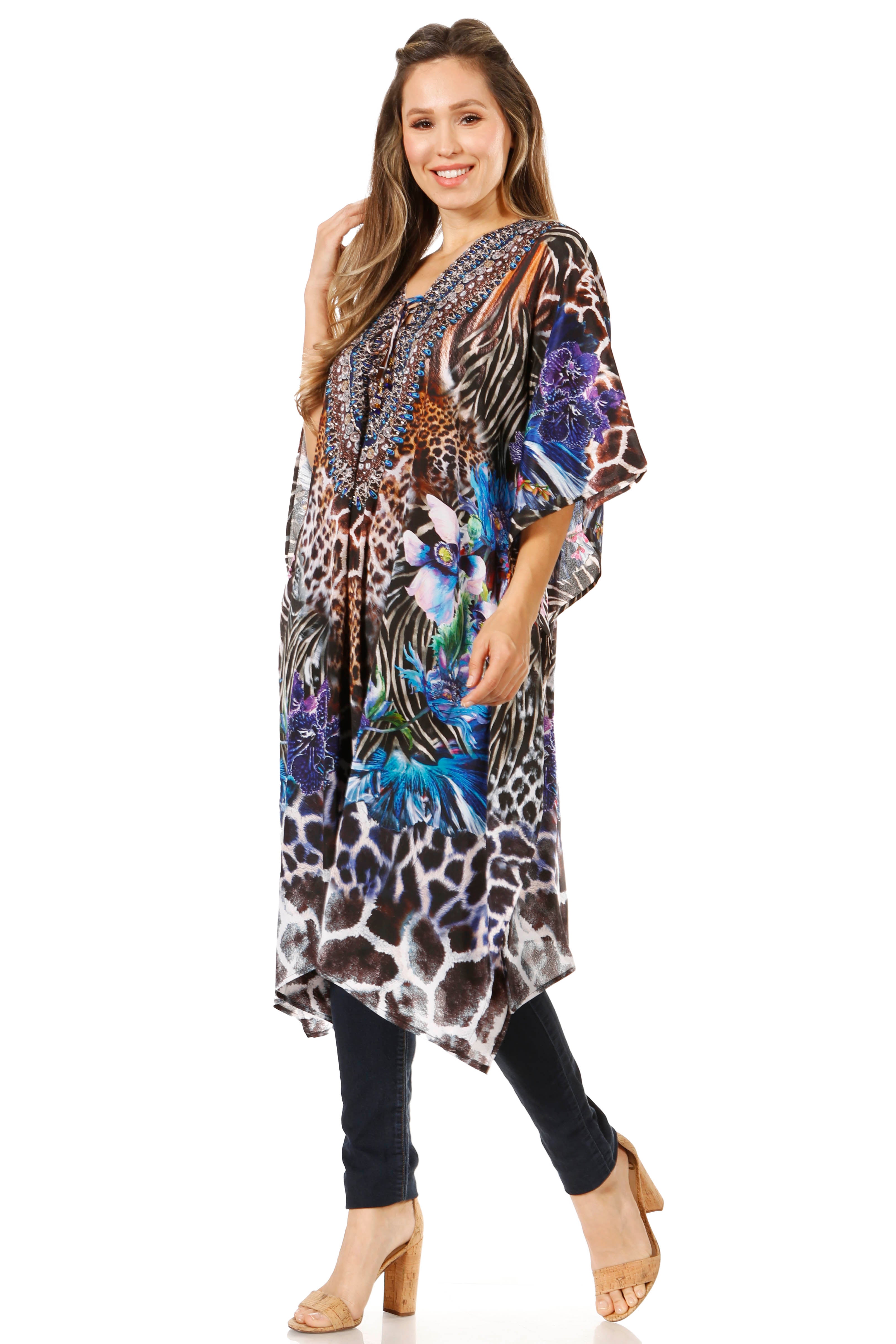 Woman wearing a colorful patterned dress on a white background