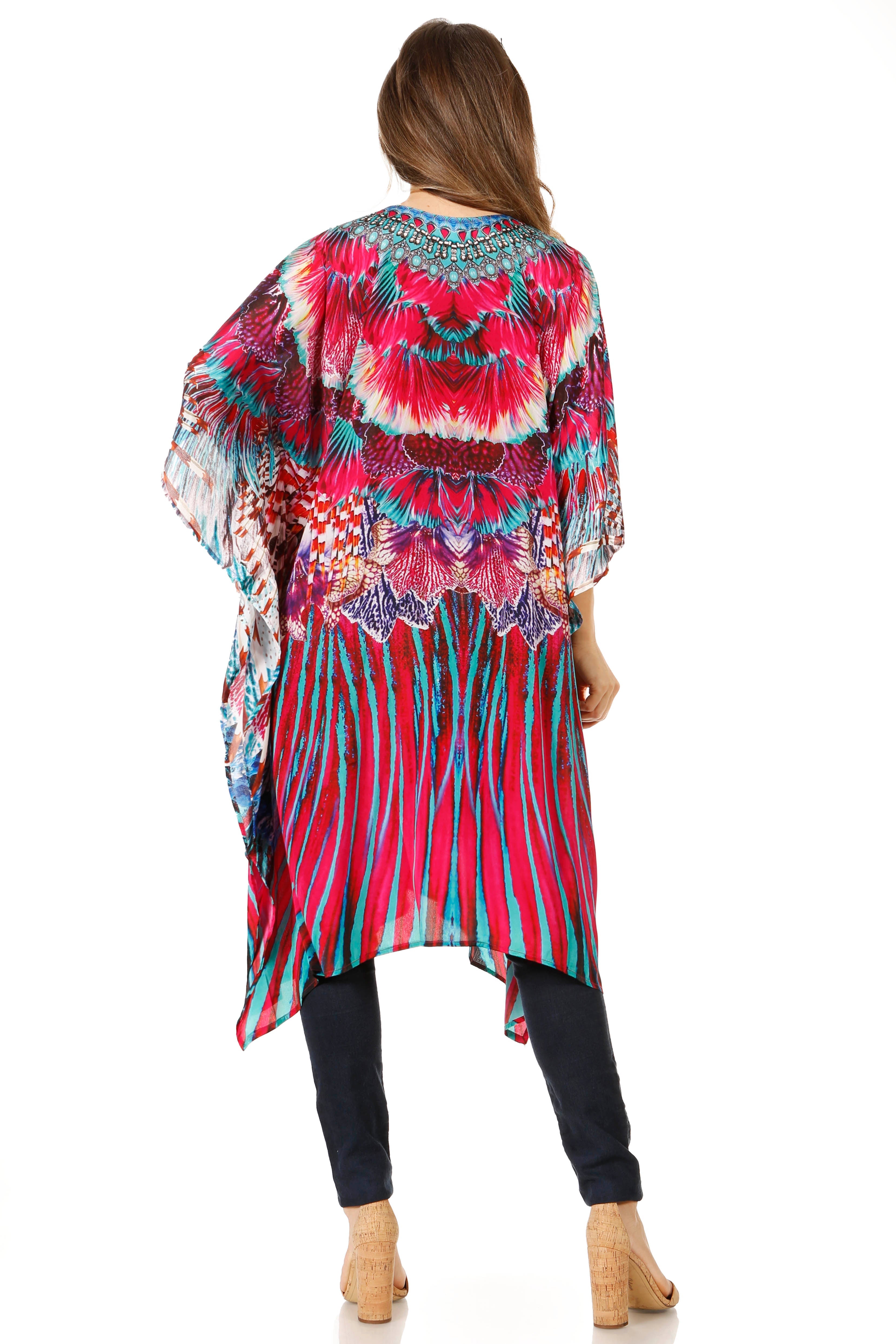 Woman wearing a colorful kimono-style top with a white background