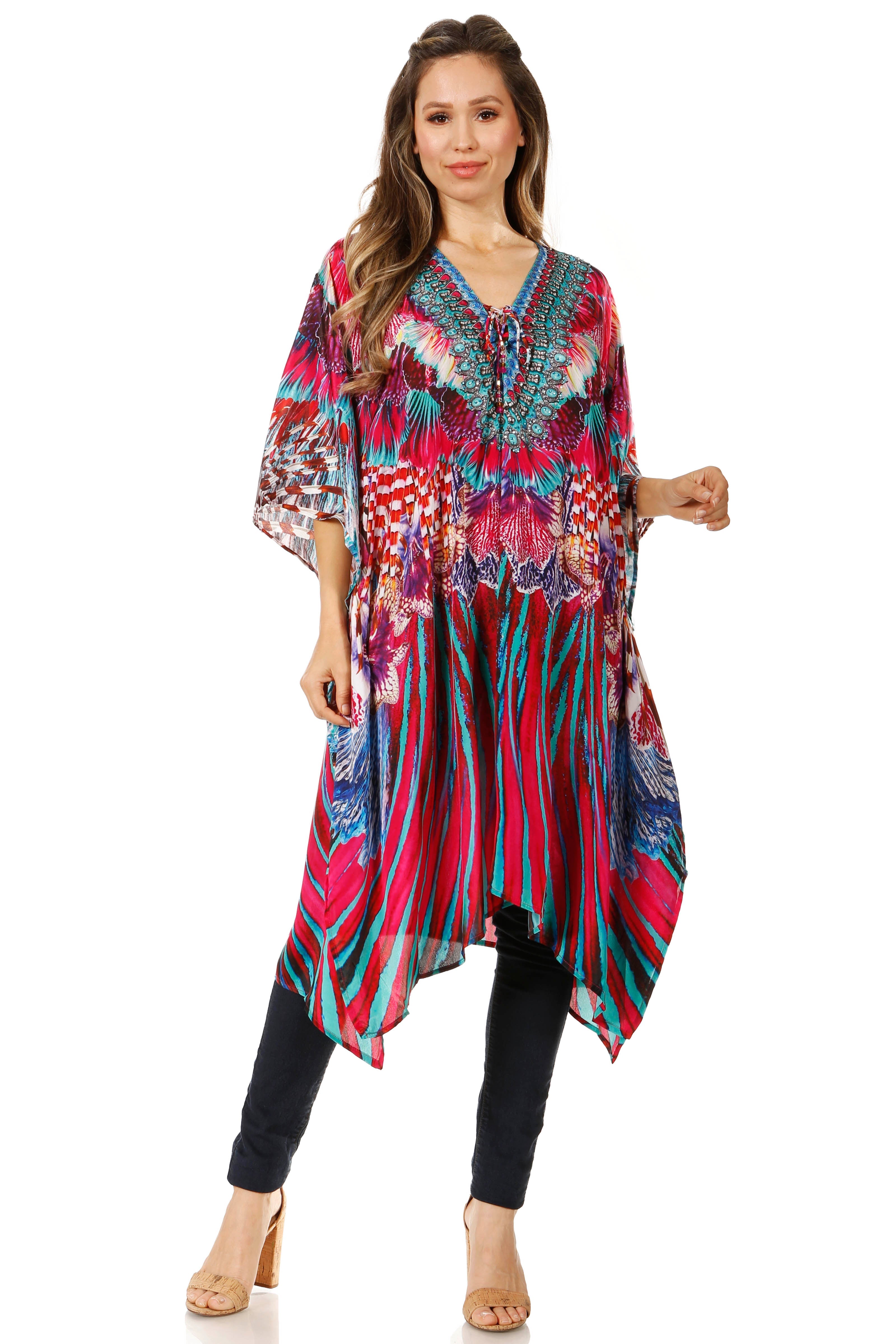 Woman wearing a colorful patterned dress on a white background
