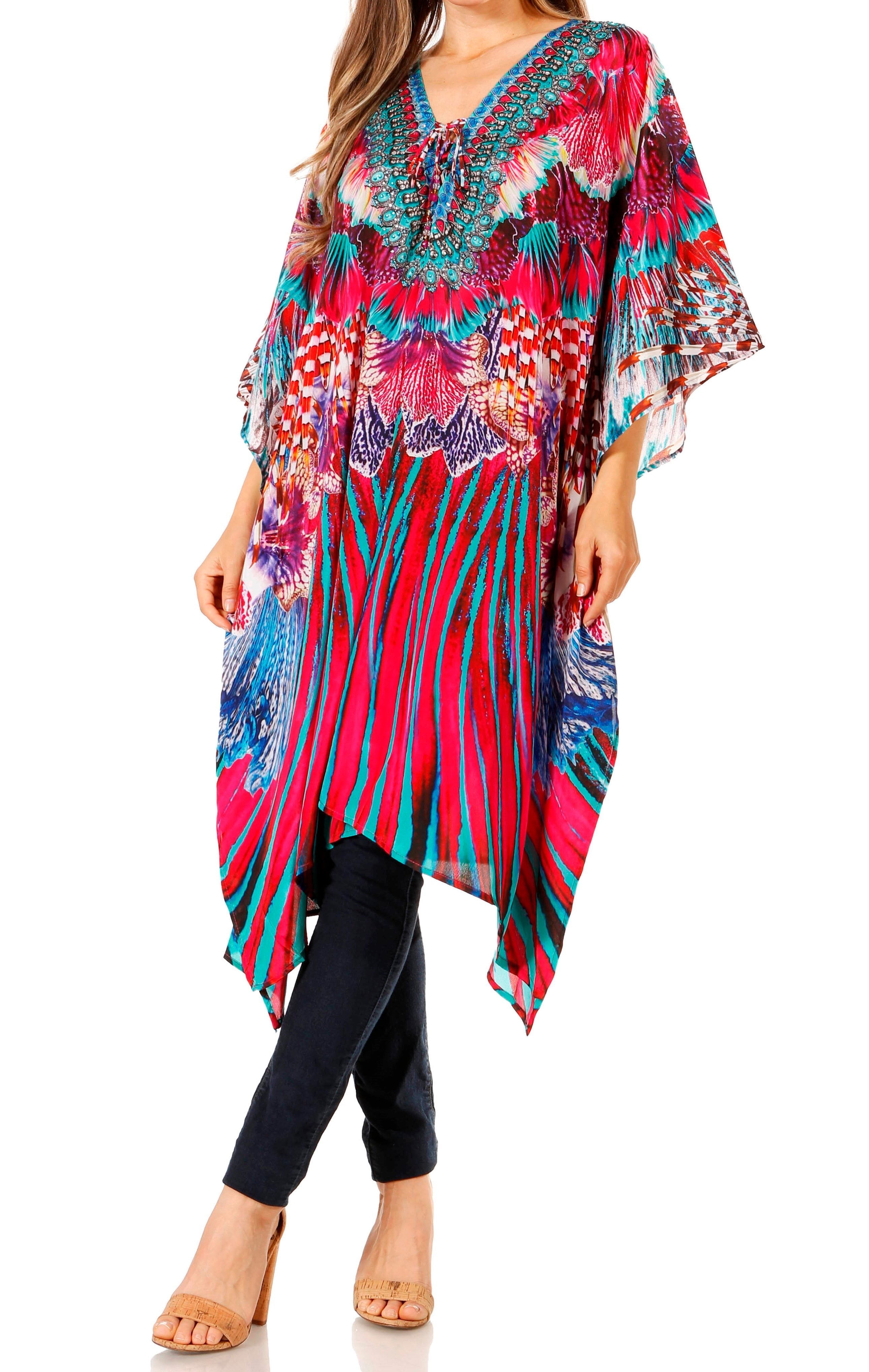 Colorful patterned dress over black leggings on a white background