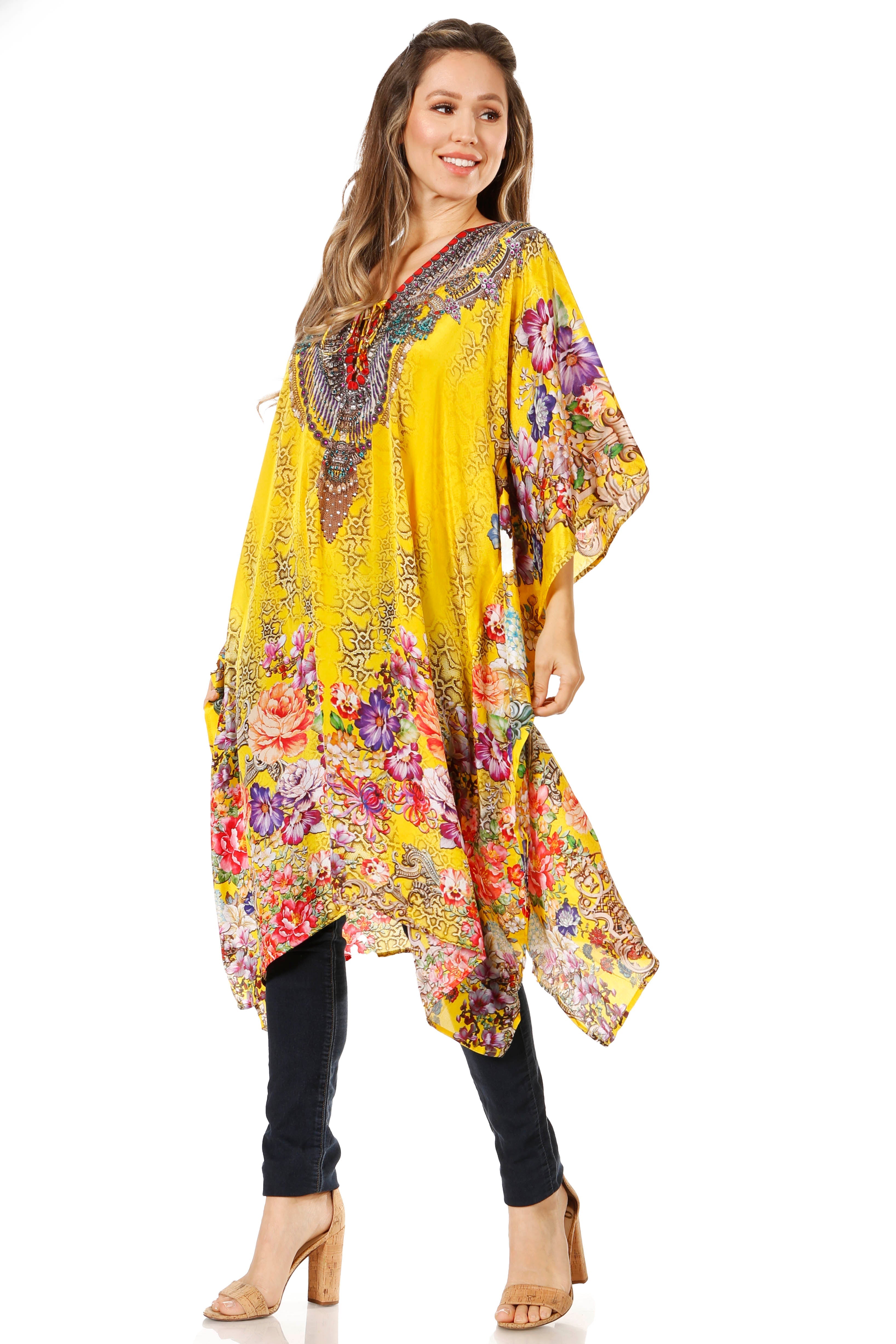 Woman wearing a yellow floral dress on a white background
