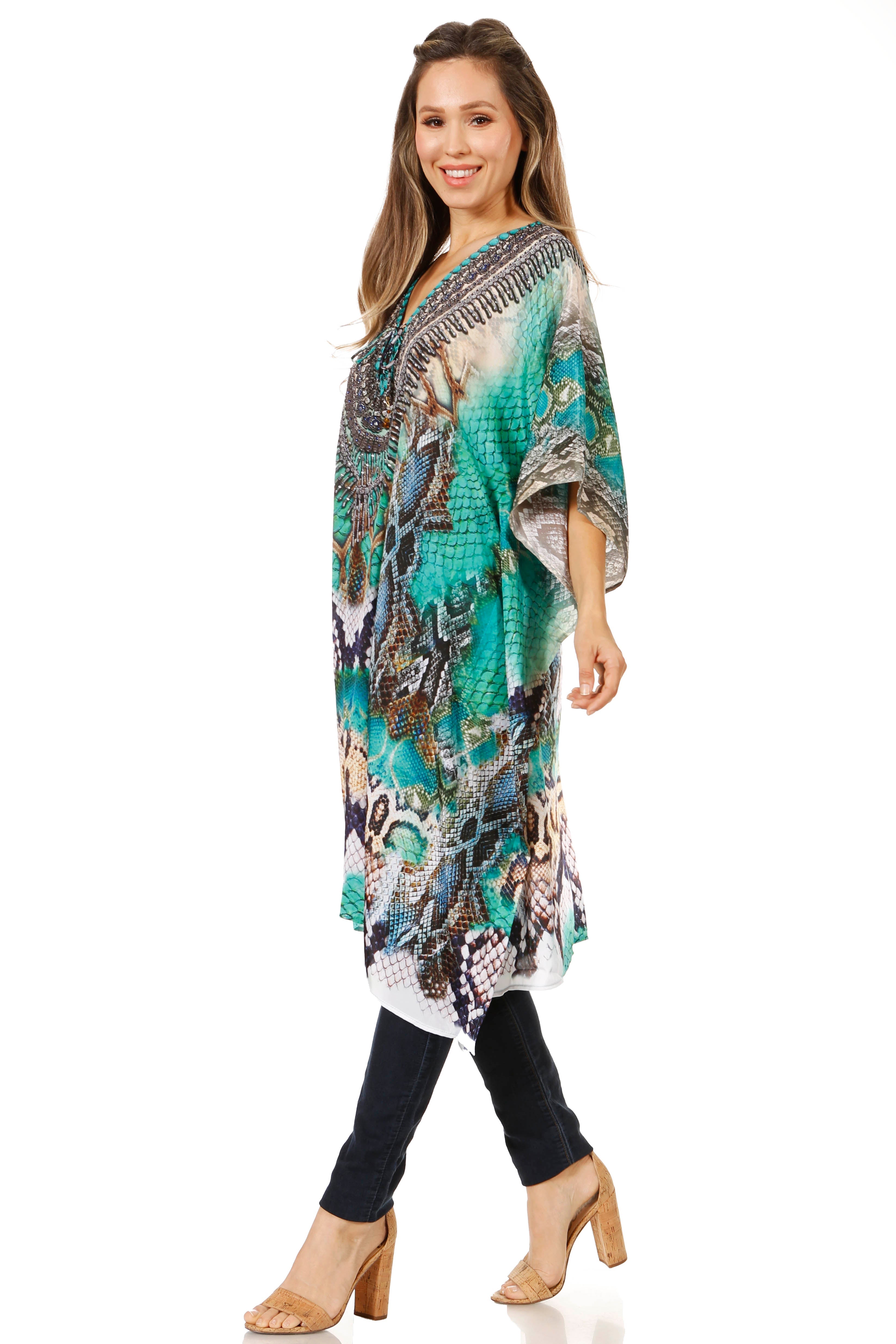 Woman wearing a colorful patterned dress on a white background