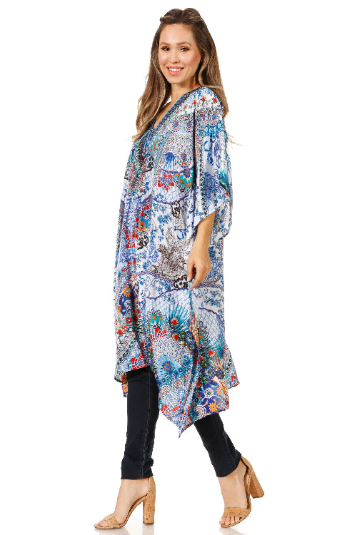 Woman wearing a colorful floral dress with a white background