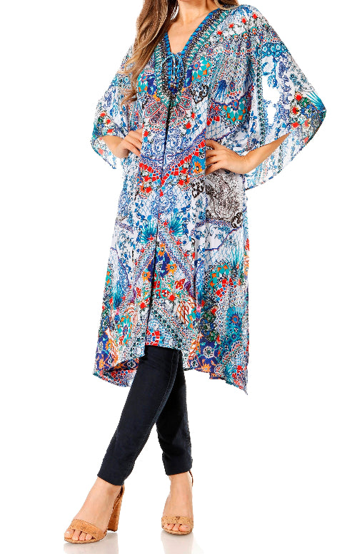 Woman wearing a colorful patterned kimono-style top on a white background