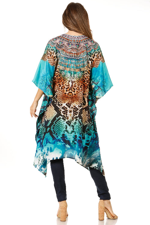 Woman wearing a colorful patterned dress with a white background