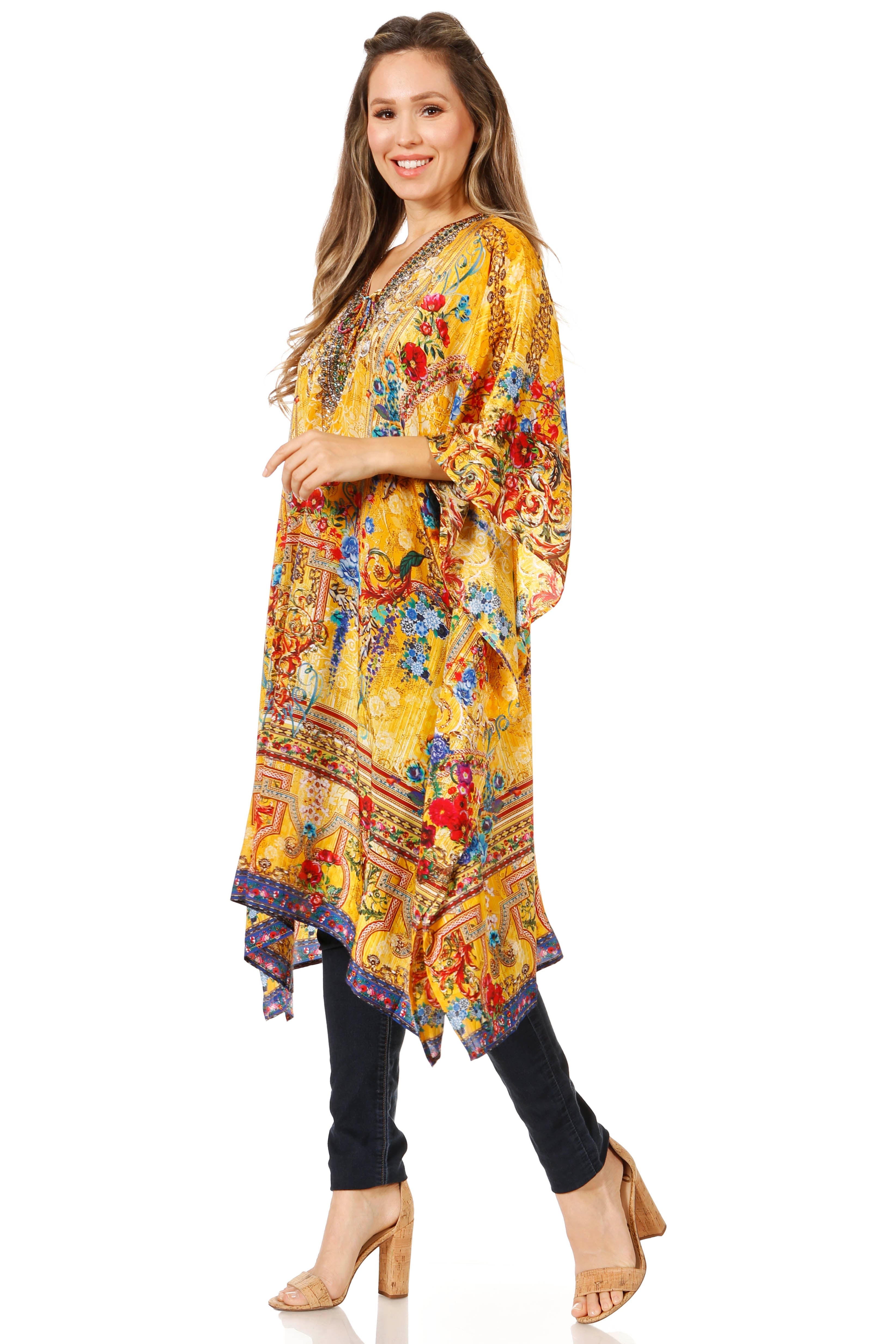 Woman wearing a colorful floral dress with a white background