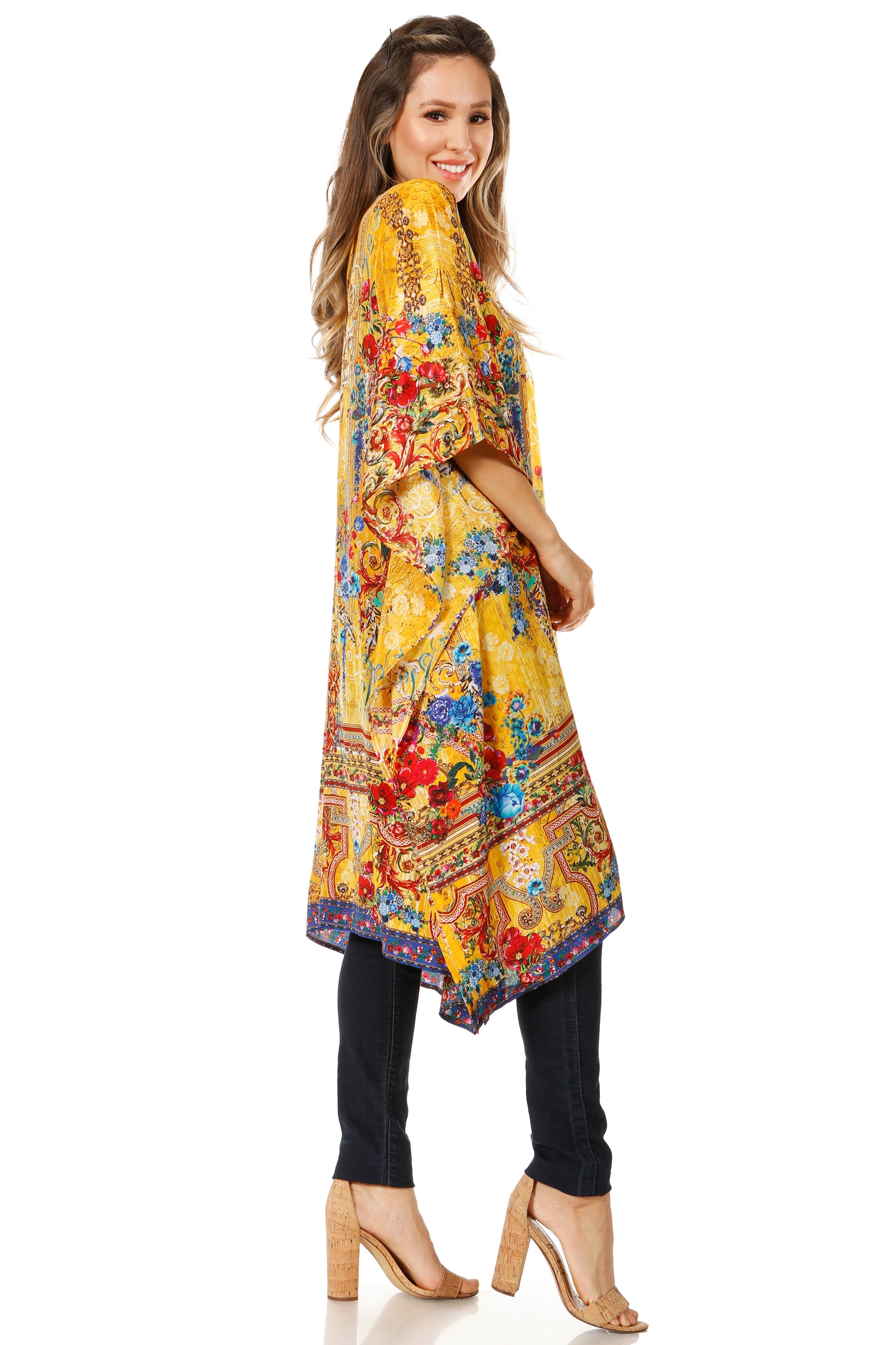 Woman wearing a colorful floral dress with a white background