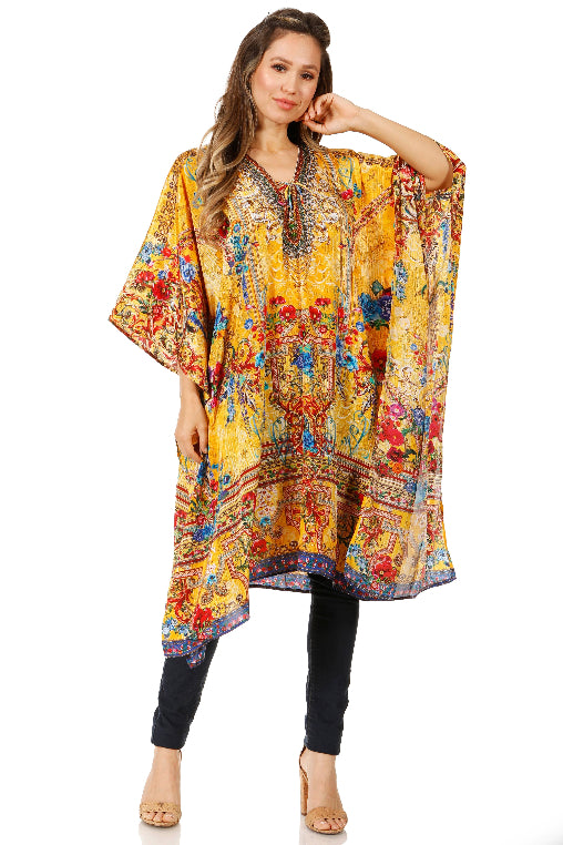 Woman wearing a colorful, patterned dress on a white background