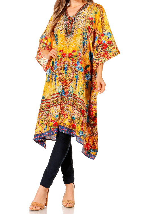 Woman wearing a colorful patterned dress with a white background
