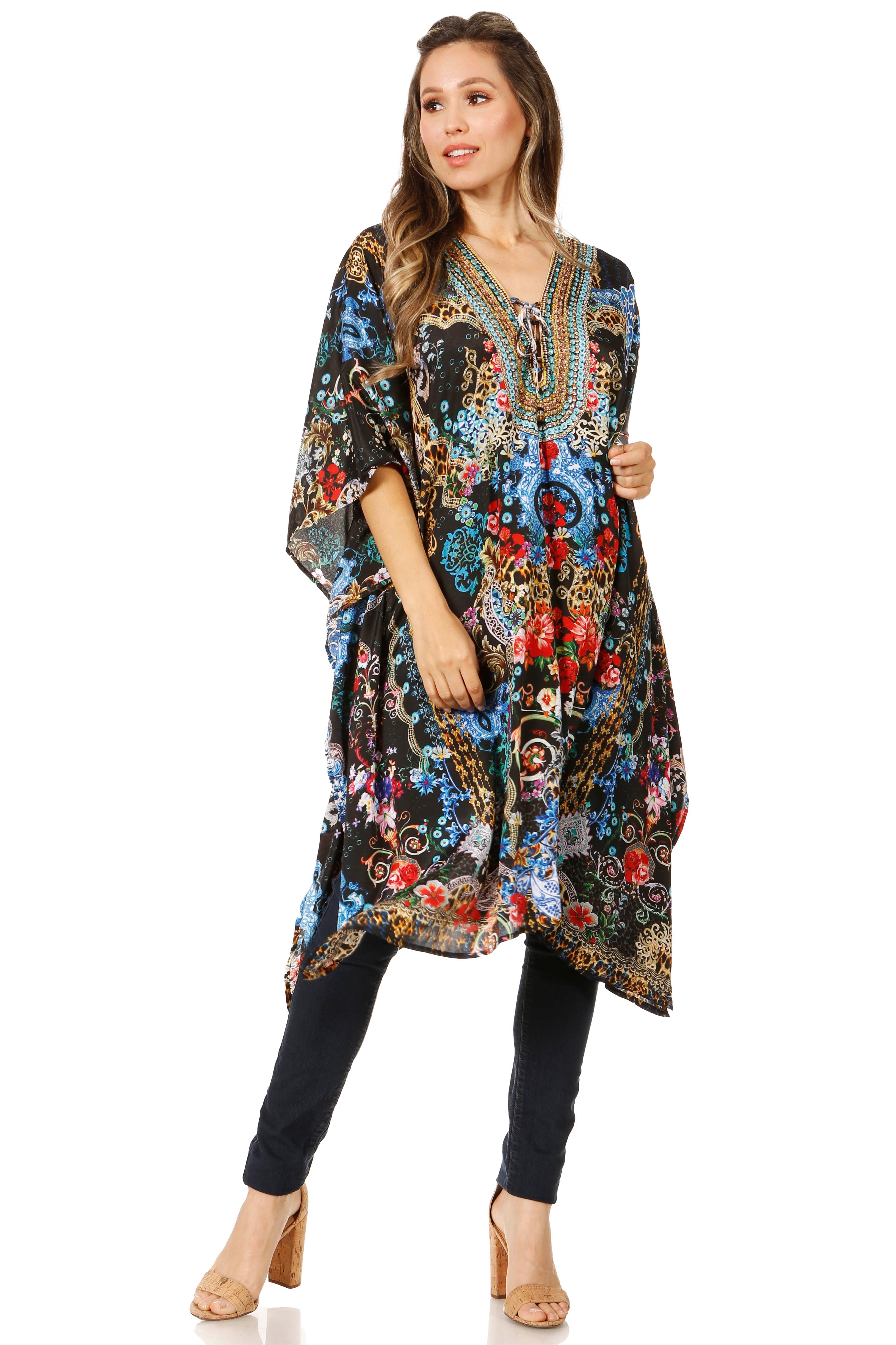 Woman wearing a colorful floral dress on a white background