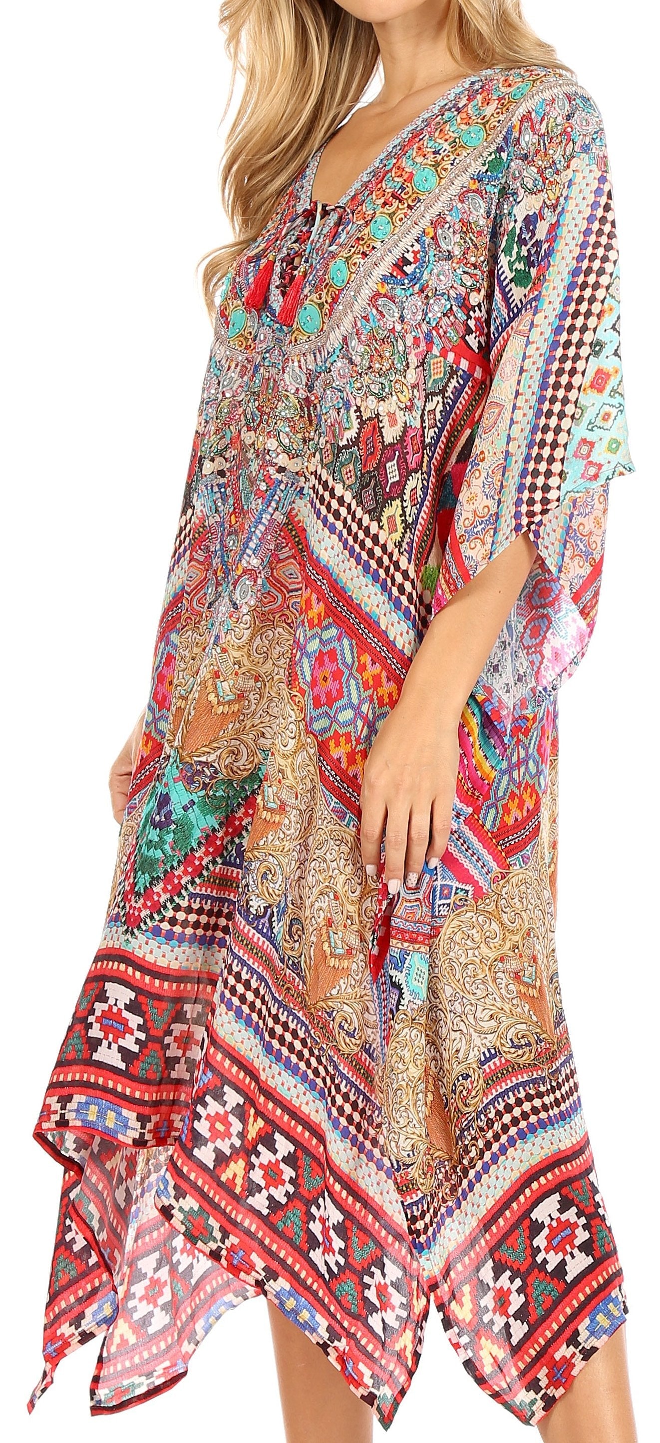 Woman wearing a colorful patterned dress with a V-neck and long sleeves.