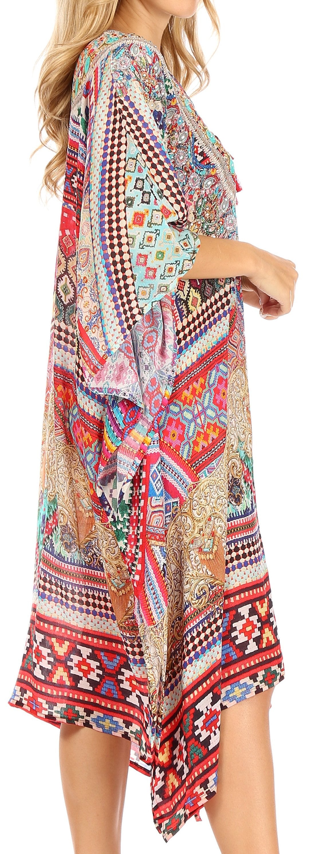 Colorful patterned dress with a V-neck and long sleeves on a plain background
