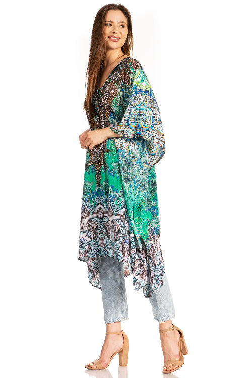 Woman wearing a colorful patterned kimono-style top on a white background