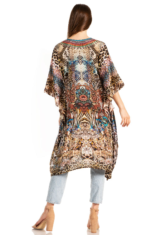 Woman wearing a patterned kimono-style garment on a white background
