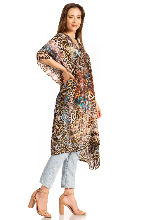 Woman wearing a patterned kimono over a outfit on a white background