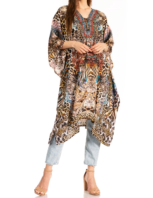 Woman wearing a long, patterned kimono-style garment on a white background
