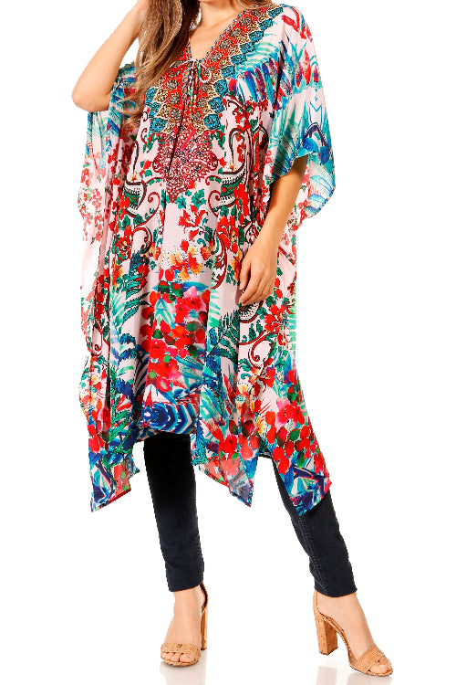 Woman wearing a colorful patterned dress with a white background
