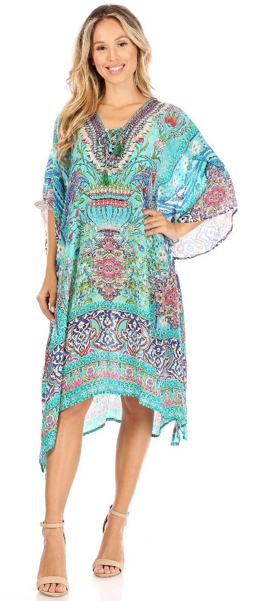 Woman wearing a colorful patterned dress on a white background