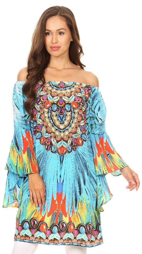 Woman wearing a colorful off-shoulder dress with a vibrant pattern on a white background