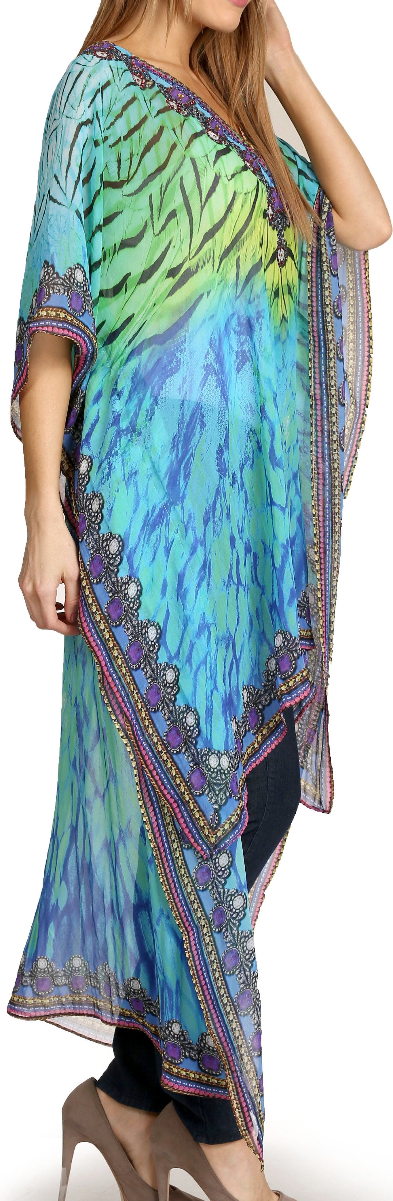 Colorful patterned dress with a long scarf draped over one shoulder.