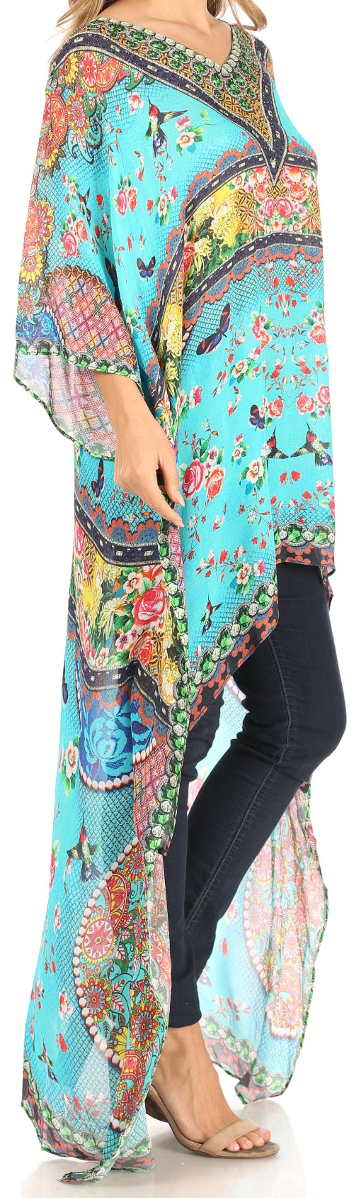Floral patterned kimono-style garment on a person wearing black leggings.