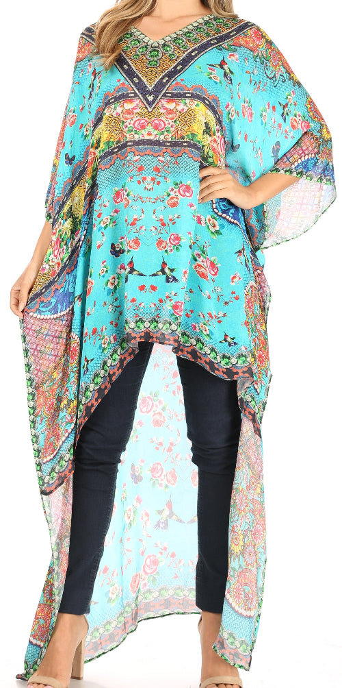 Woman wearing a colorful floral kimono-style garment with a blue background