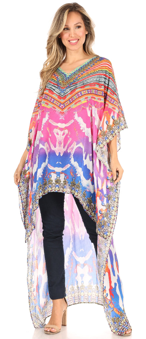 Woman wearing a colorful patterned kaftan over black pants