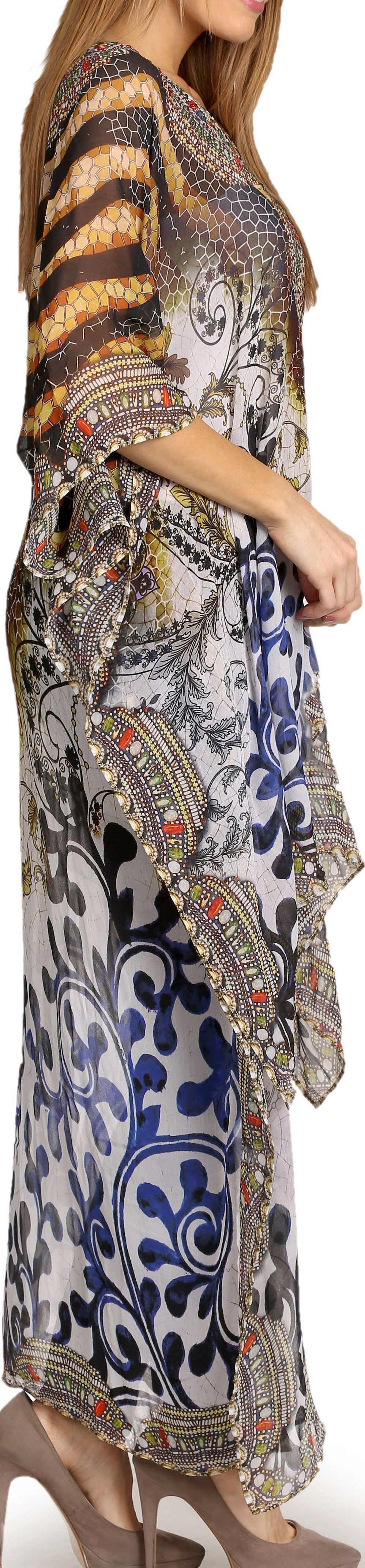 Woman wearing a long, patterned dress with a paisley design.