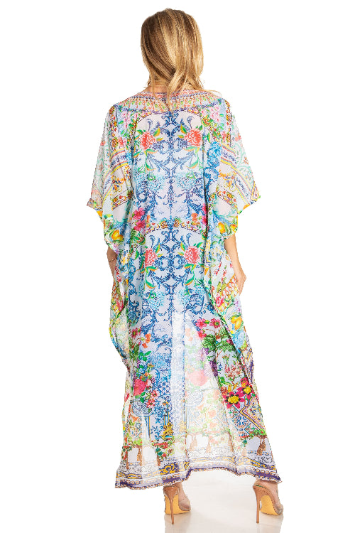 Woman wearing a colorful patterned dress on a white background