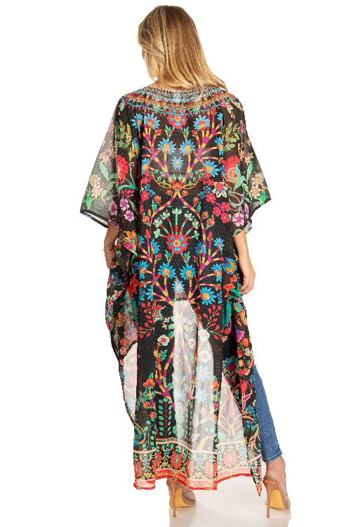 Woman wearing a colorful floral kimono-style garment on a white background