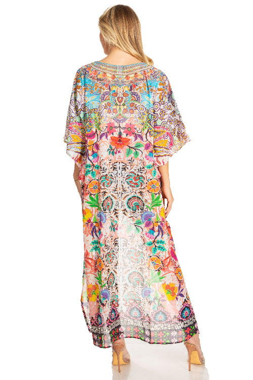 Woman wearing a colorful floral dress with a white background