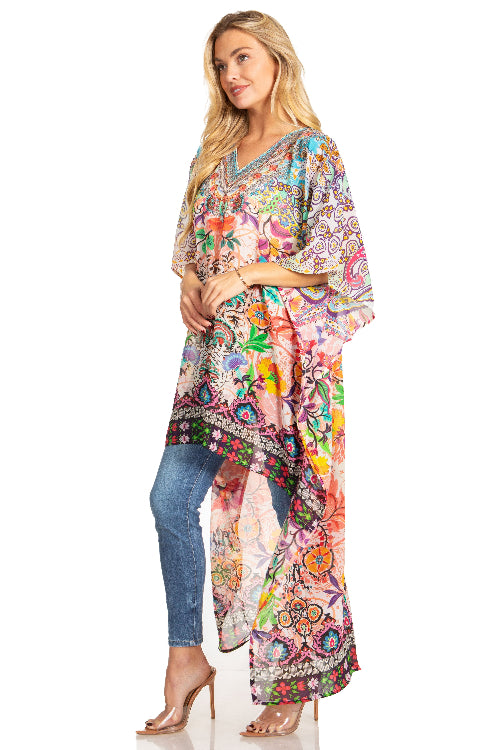 Woman wearing a colorful floral dress with a white background