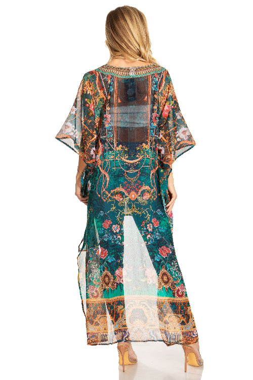 Colorful patterned dress with a sheer overlay on a white background